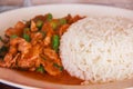 Close up stir fried pork with red curry paste and organic green bean , Thai food Royalty Free Stock Photo