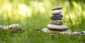 Spirituality: Stone cairn in the park. Balance and relaxation Royalty Free Stock Photo