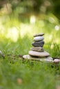 Spirituality: Stone cairn in the park. Balance and relaxation Royalty Free Stock Photo