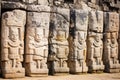 close-up of stone carvings on pillar remains