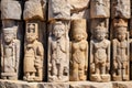 close-up of stone carvings on pillar remains