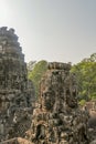 Close up of stone faces at Bayon Temple in Angkor Tom, Siem Reap, Cambodia Royalty Free Stock Photo
