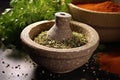 close-up of a stone mortar with crushed coriander seeds