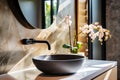 Close-up of Stone vessel sink with mirror in a modern bathroom, art deco style, natural luxury decoration Royalty Free Stock Photo