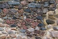 Close-up of a stone wall of an old castle in Dobele, Latvia Royalty Free Stock Photo