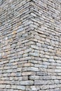 Close-up of stone wall use for construction business and designers. Stone backgrounds textured pattern abstract image.