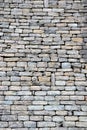 Close-up of stone wall use for construction business and designers. Stone backgrounds textured pattern abstract image.