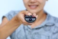 Close Up straight image of a female hand holding remote control, Focus at Infrared bulb of Remote Royalty Free Stock Photo