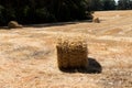 Close up of straw bales with a wood background