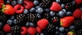 a close up of strawberries , raspberries , blueberries and blackberries Royalty Free Stock Photo