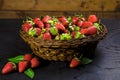 Close-up of strawberries in wicker basket on table