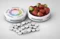 Close up of Strawberry and pills isolated - vitamin concept