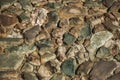 Close-up of street pavement made of rough stones at Caceres