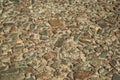 Close-up of street pavement made of rough stones at Caceres