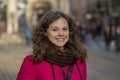 Close-up of a street portrait of a cheerful, successful middle-aged woman with delicate features. A woman of 30-35 years old, who Royalty Free Stock Photo