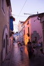 Close Up of Street in the Town of Rotonda during Traditional Celebrations with Blurred People Walking at Evening