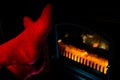 Close up of Stretching Feet in Red Socks by Fireplace