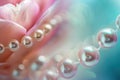 Close up of a string of pearls intertwined with delicate flower petals in soft lighting Royalty Free Stock Photo