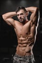 Close up strong abs guy showing in the gym muscles Royalty Free Stock Photo