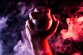 Close-up of a strong male hand holding a white baseball ball Royalty Free Stock Photo