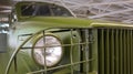 A close-up of the Studebaker US6 round headlight. Three-axle truck produced from 1941 to 1945. Increased cross-country ability and Royalty Free Stock Photo