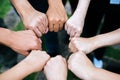 Close up of students standing hands making fist bump Royalty Free Stock Photo