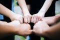 Close up of students standing hands making fist bump Royalty Free Stock Photo