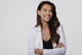 Close-up studio portait of attractive middle aged woman with toothy smile against white background Royalty Free Stock Photo