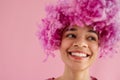 Close up studio portrait of attractive cute fun female african ethnicity with beautiful white toothed smile