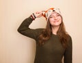 Close up studio portrait of cheerful hipster girl in funny fox h