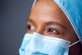 Close Up Studio Portrait Of Female Surgeon Wearing Scrubs And Face Mask Royalty Free Stock Photo