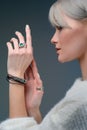 Close-up studio portrait model demonstrate stylish ring and bracelet Royalty Free Stock Photo