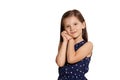 Close-up studio shot of beautiful brunette little girl posing isolated on white studio background. Royalty Free Stock Photo