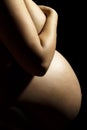 Pregnant woman Belly on black background
