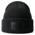A classic ribbed black beanie with a leather patch detail isolated on white background Royalty Free Stock Photo