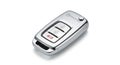 Sleek silver car key remote control on white background Royalty Free Stock Photo
