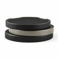 Stack of Three Fluted Edge Coins or Tokens in Black and Silver on White Background image Royalty Free Stock Photo