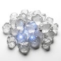 Pile of Crushed Ice Cubes with Blue Light Illumination on White Background cold frozen Royalty Free Stock Photo