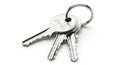 Three Silver Keys Attached to a Metal Ring on a White Background keyring Royalty Free Stock Photo