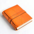 Orange leather journal with strap, classic design, isolated on white background Royalty Free Stock Photo
