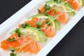 Close up studio shot of salmon avocado carpaccio