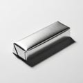 A single rectangular object wrapped in shiny silver foil casting a shadow on a white background Royalty Free Stock Photo
