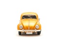 Close-up studio shot small orange toy car isolated on white Royalty Free Stock Photo