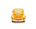 Close-up studio shot small orange toy car isolated on white Royalty Free Stock Photo