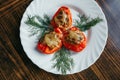 Close up of stuffed red bell peppers with minced meat, rice, onion, parmesan cheese Royalty Free Stock Photo