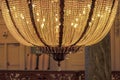 Close up of a stunning chandelier with sparkling and glittering crystal beads Royalty Free Stock Photo