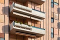 Close-up on stylish balconies on sunny day Royalty Free Stock Photo