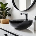 Close up of stylish black ceramic round vessel sink and chrome faucet on white vanity. Minimalist interior design of modern Royalty Free Stock Photo