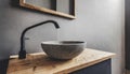 Close up of stylish black ceramic round vessel sink and chrome faucet on white vanity. Minimalist interior design of modern Royalty Free Stock Photo