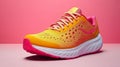 Vibrant OrangePink Running Shoe on Pink Background Royalty Free Stock Photo